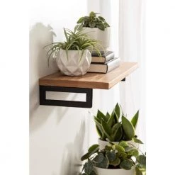 Lankford 3.00 in. x 24.00 in. x 3.00 in. Natural Wood Floating Decorative Wall Shelf Without Brackets by Kate and Laurel -Kate and Laurel Shop natural black kate and laurel decorative shelving 221196 76 1000